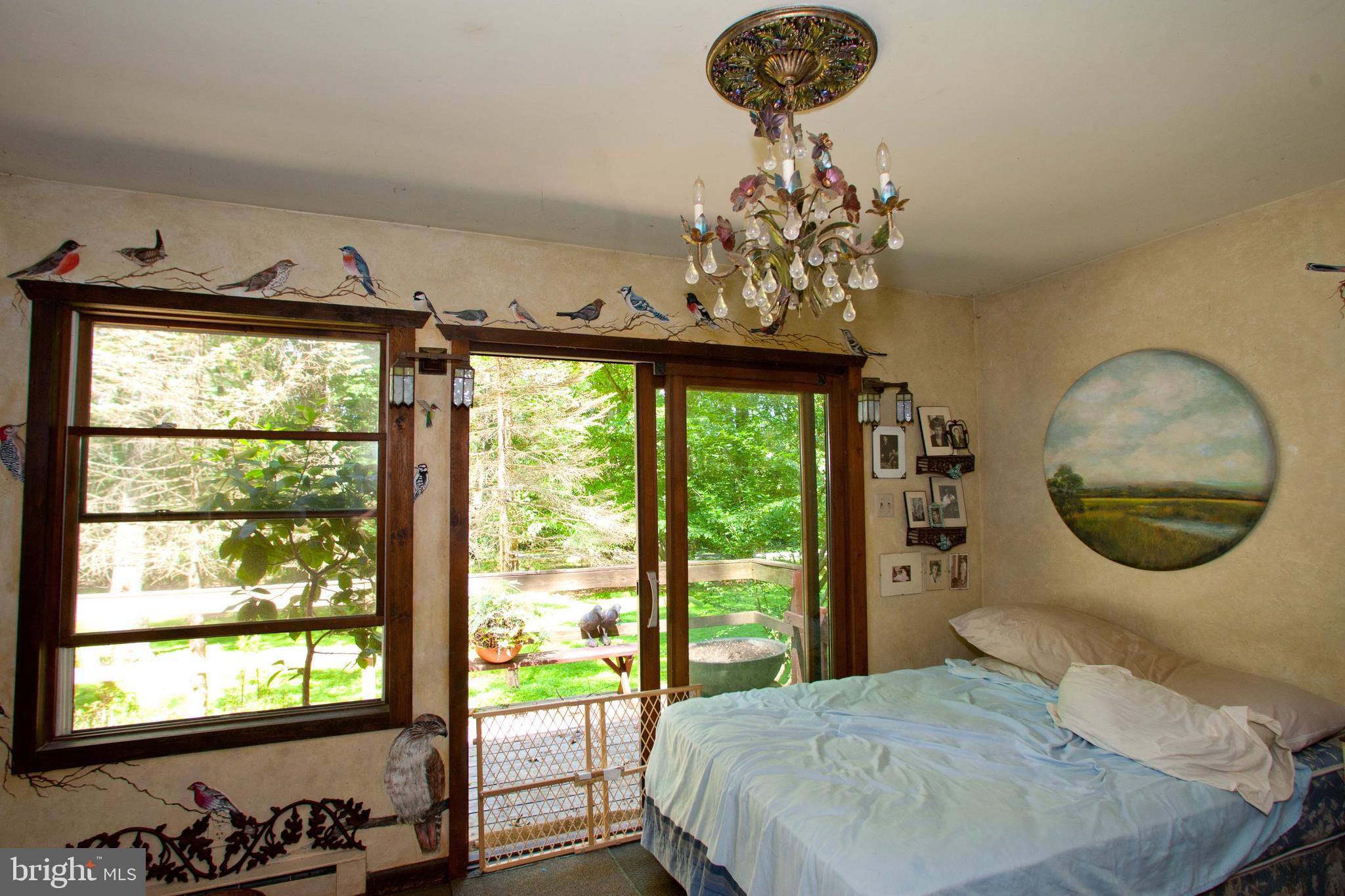 279 County Line Road Riegelsville, PA 18077 - Photo 8 of 24 a bedroom with a bed and a window