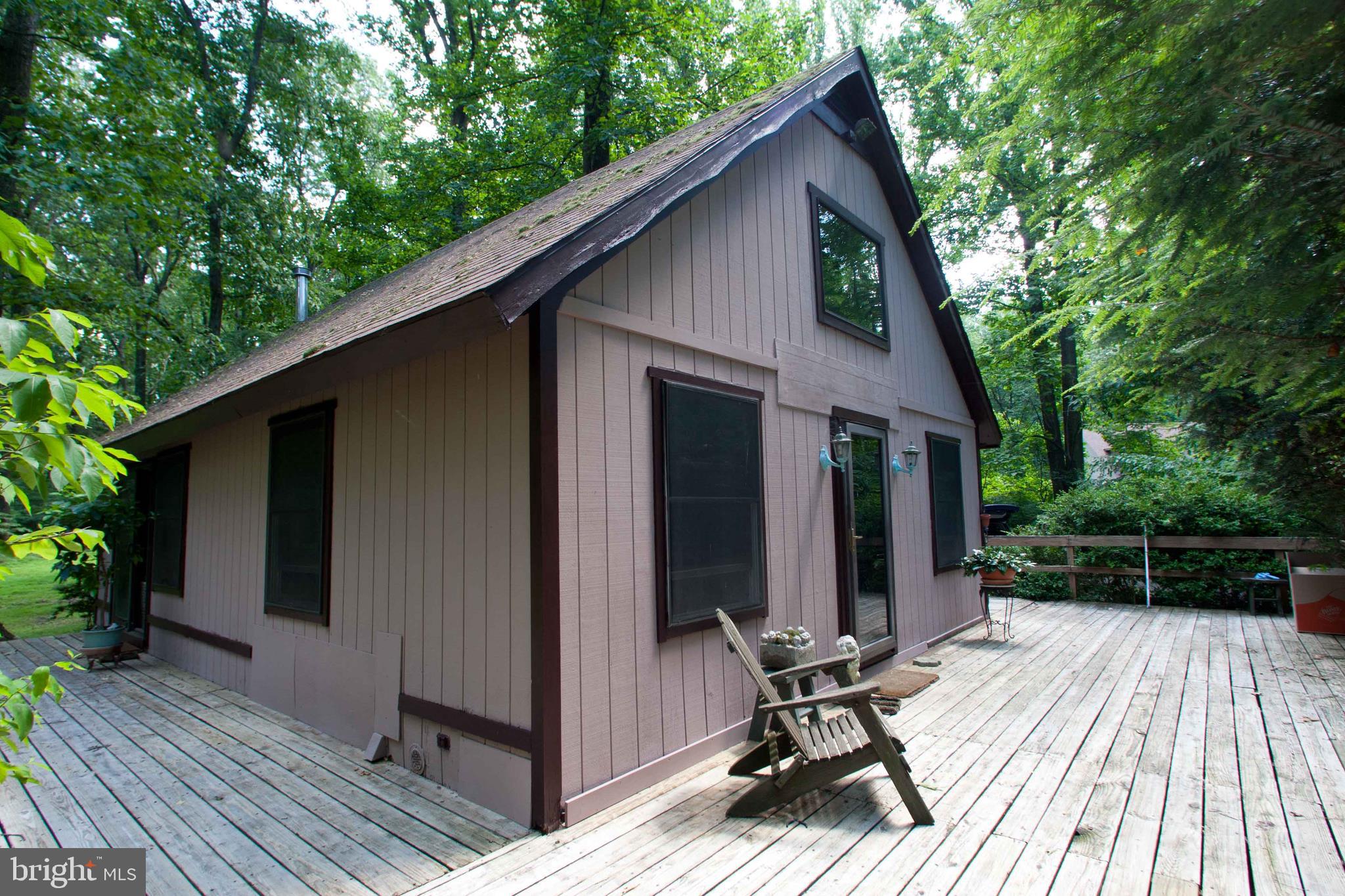279 County Line Road Riegelsville, PA 18077 - Photo 10 of 24 a view of backyard with hardwood floor and deck
