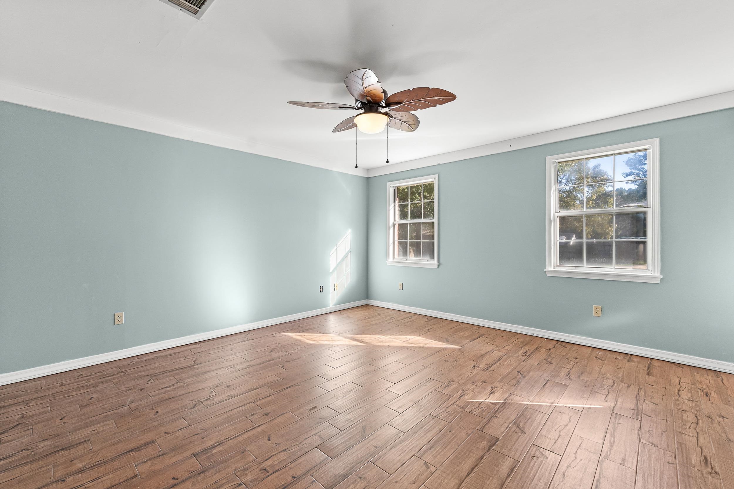 49 Cr 178 Road Iuka, MS 38852 - Photo 13 of 32 a view of an empty room with wooden floor and a window