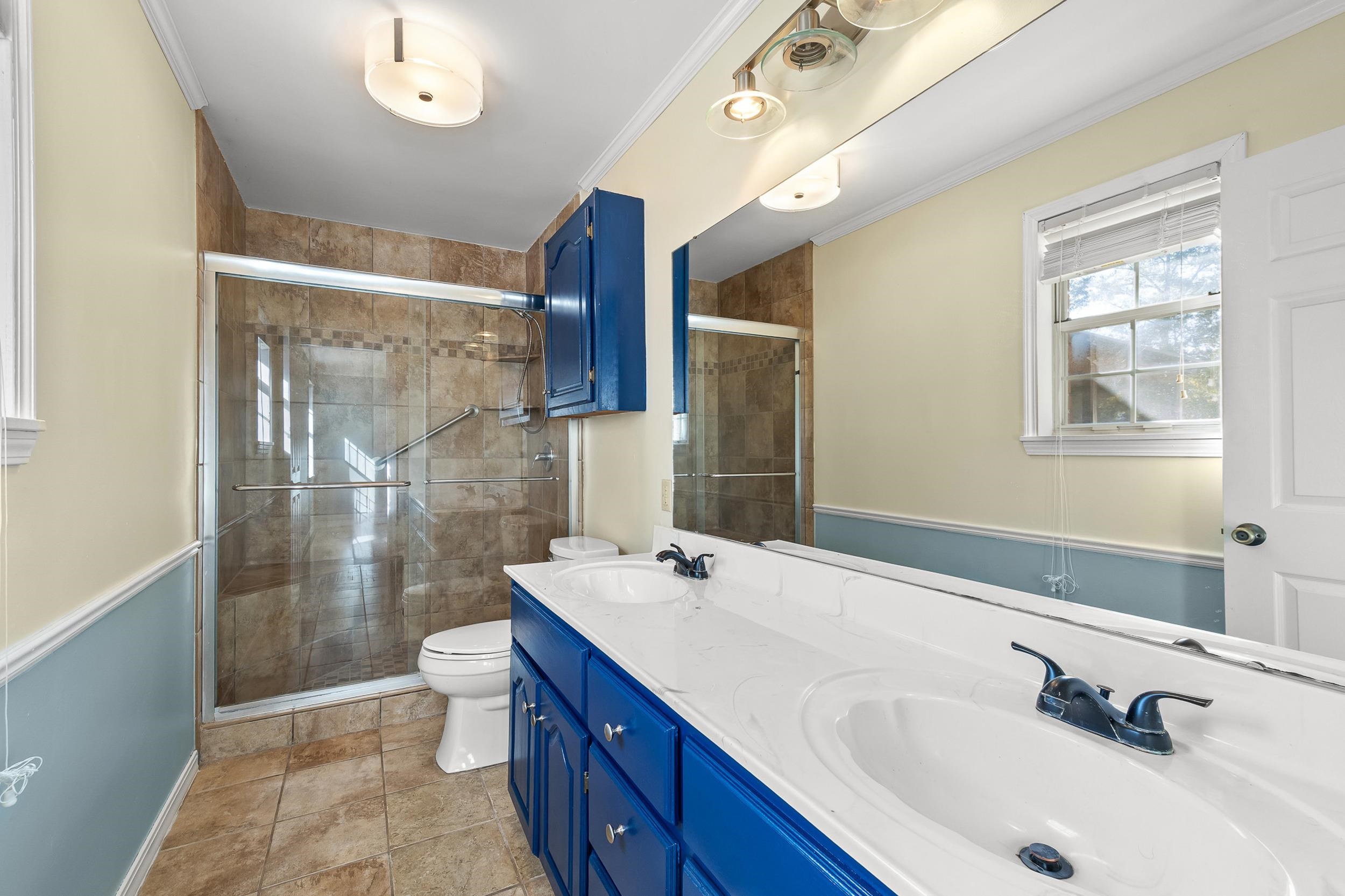 49 Cr 178 Road Iuka, MS 38852 - Photo 15 of 32 a bathroom with a tub sink toilet and a mirror
