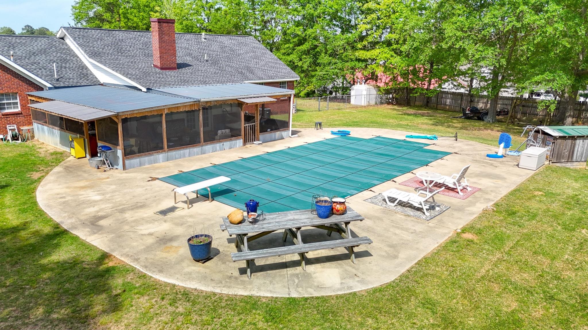 49 Cr 178 Road Iuka, MS 38852 - Photo 29 of 32 a view of a house with backyard and sitting area