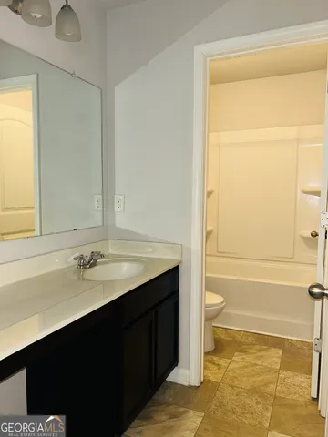 a bathroom with a bathtub