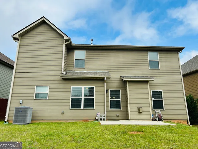 a house view with a outdoor space