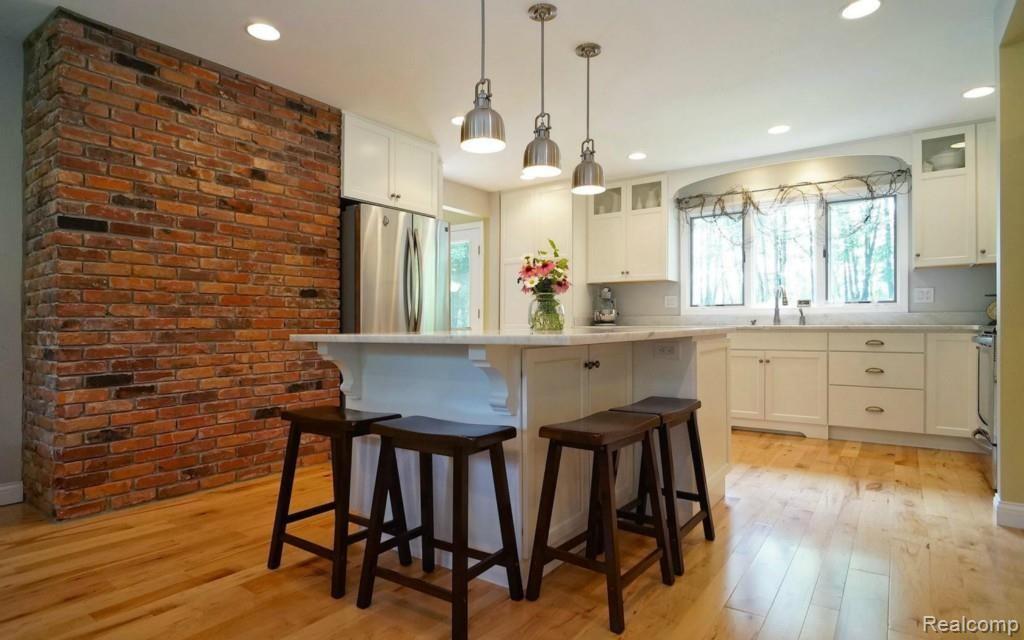 Kitchen was professionally remodeled in 2011 and has beautiful 42" white cabinets and stainless steel appliances.