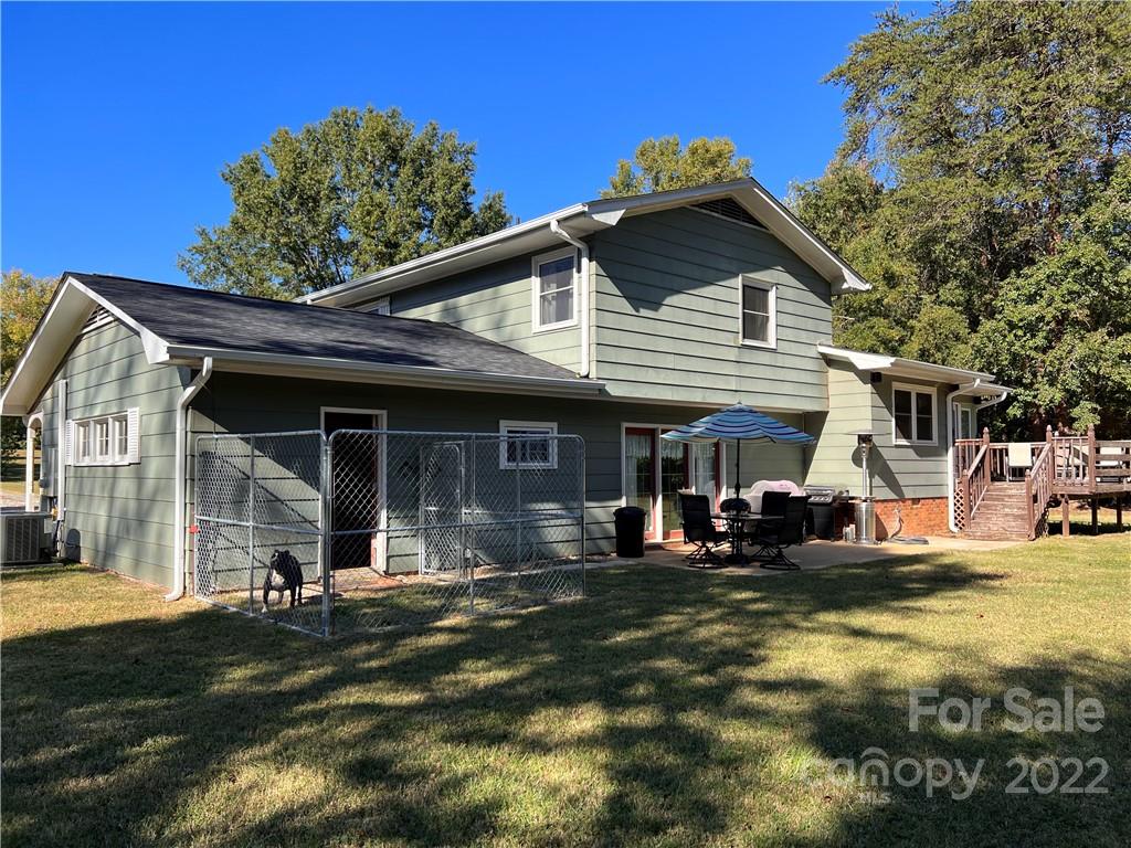 1075 Rainey Road Salisbury, NC 28146 - Photo 26 of 42 a front view of a house with a yard