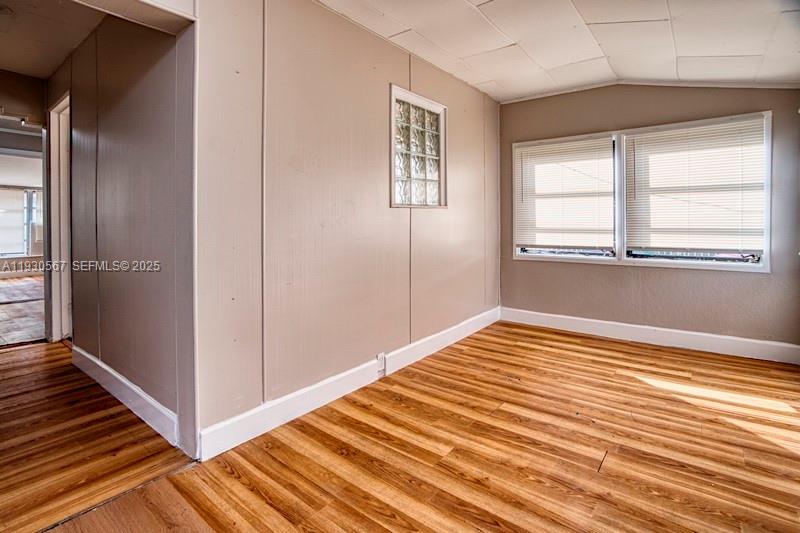 3438 Southwest 2nd Street, Unit 3438 Miami, FL 33135 - Photo 3 of 15 a view of a room with wooden floor and cabinet