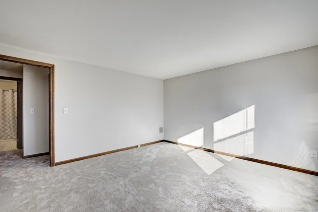 an empty room with a natural light