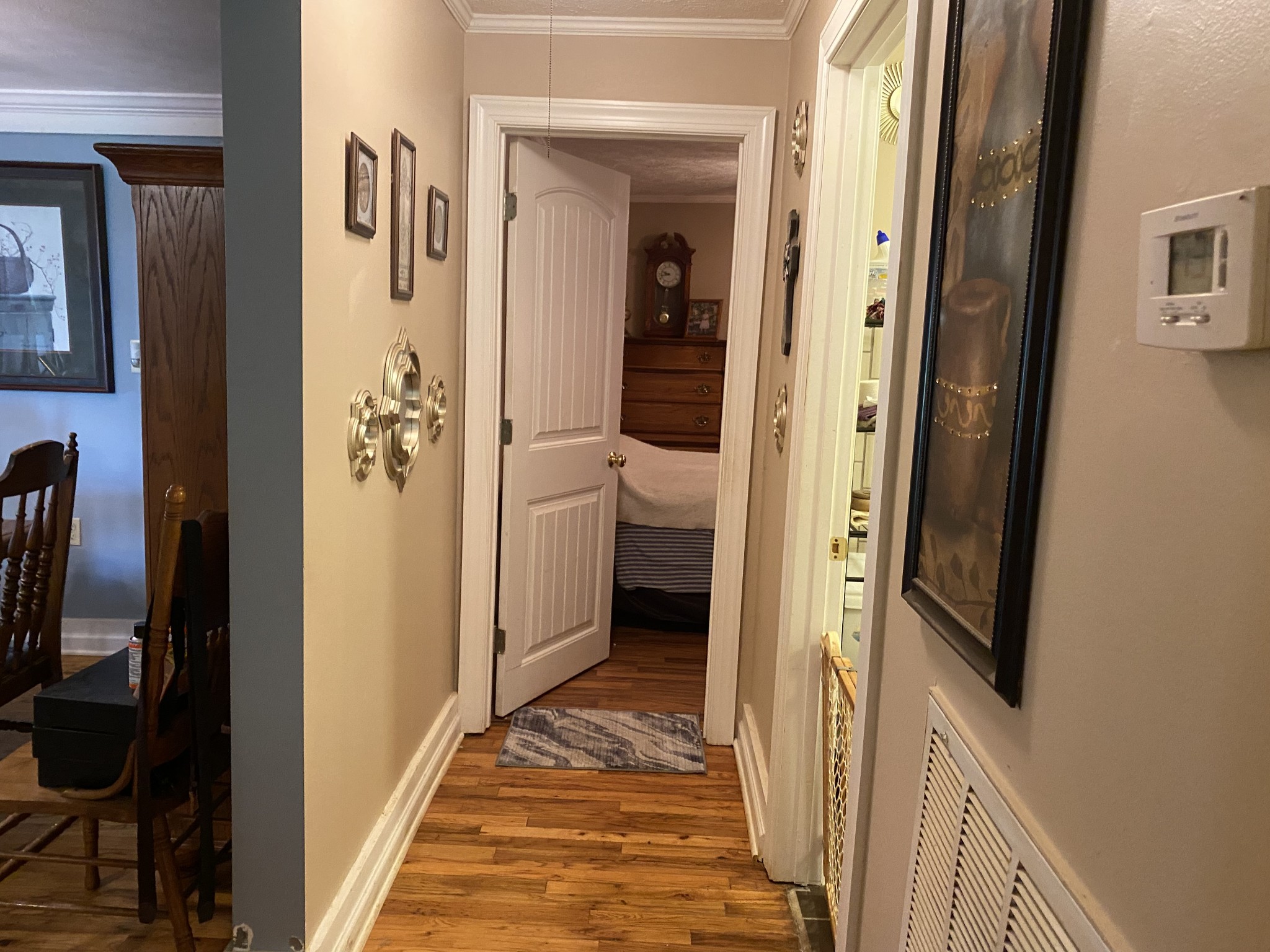 691 Hodges Bridge Road Doyle, TN 38559 - Photo 26 of 42 a view of a hallway with wooden floor and a living room