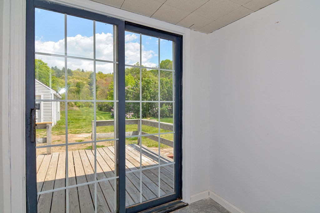 183 Palmer Road Monson, MA 01057 - Photo 23 of 33 a view of a room with wooden floor and stairs