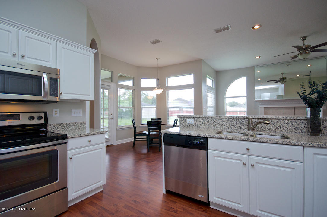11121 Wingate Road Jacksonville, FL 32218 - Photo 8 of 26 Stainless & Granite Kitchen