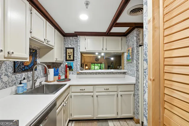 a bedroom with furniture or couch and a large window