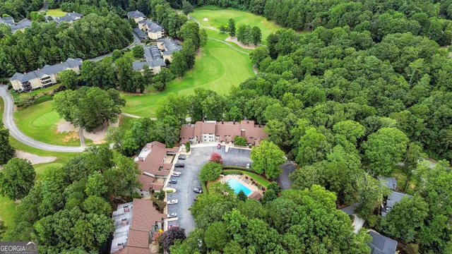 a view of a garden with houses