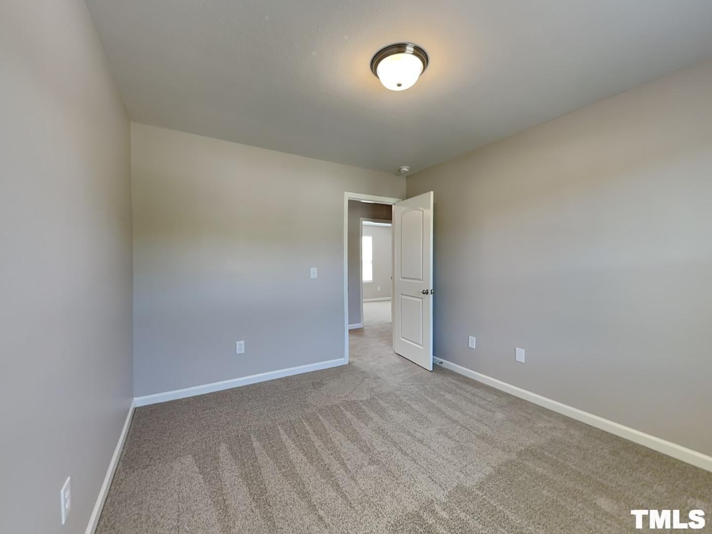 1908 Buffalo Way Durham, NC 27704 - Photo 15 of 18 a view of an empty room and window