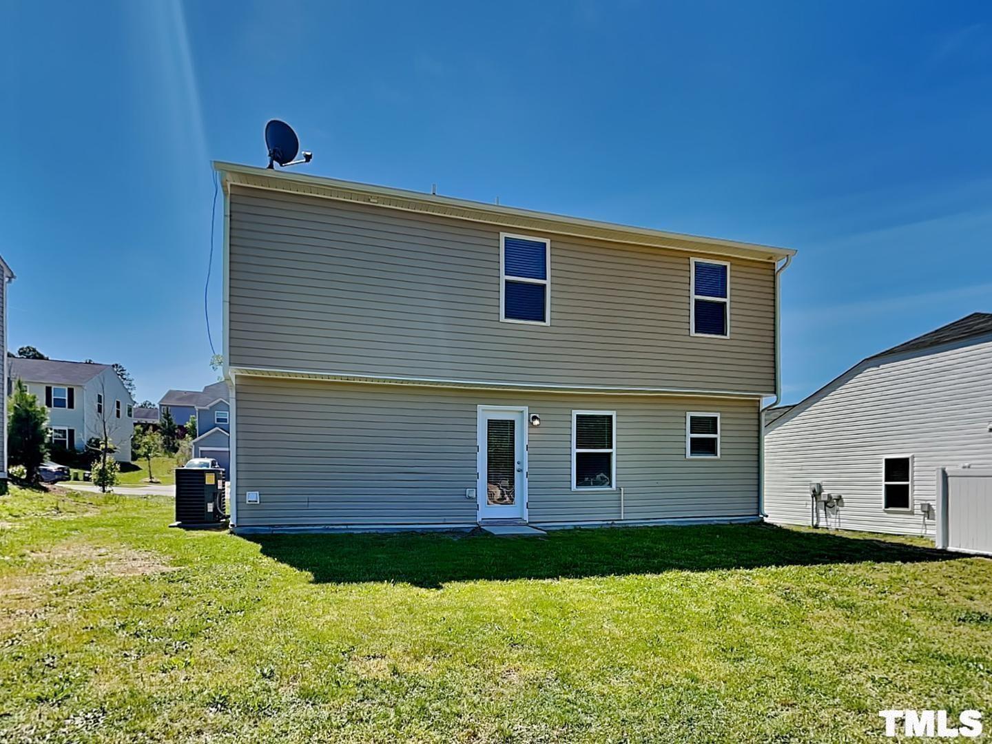 1908 Buffalo Way Durham, NC 27704 - Photo 18 of 18 a view of a backyard of the house