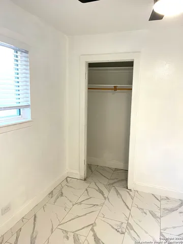 an empty room with a window