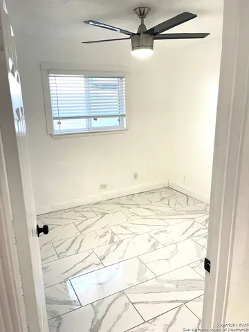 a view of a room with a window