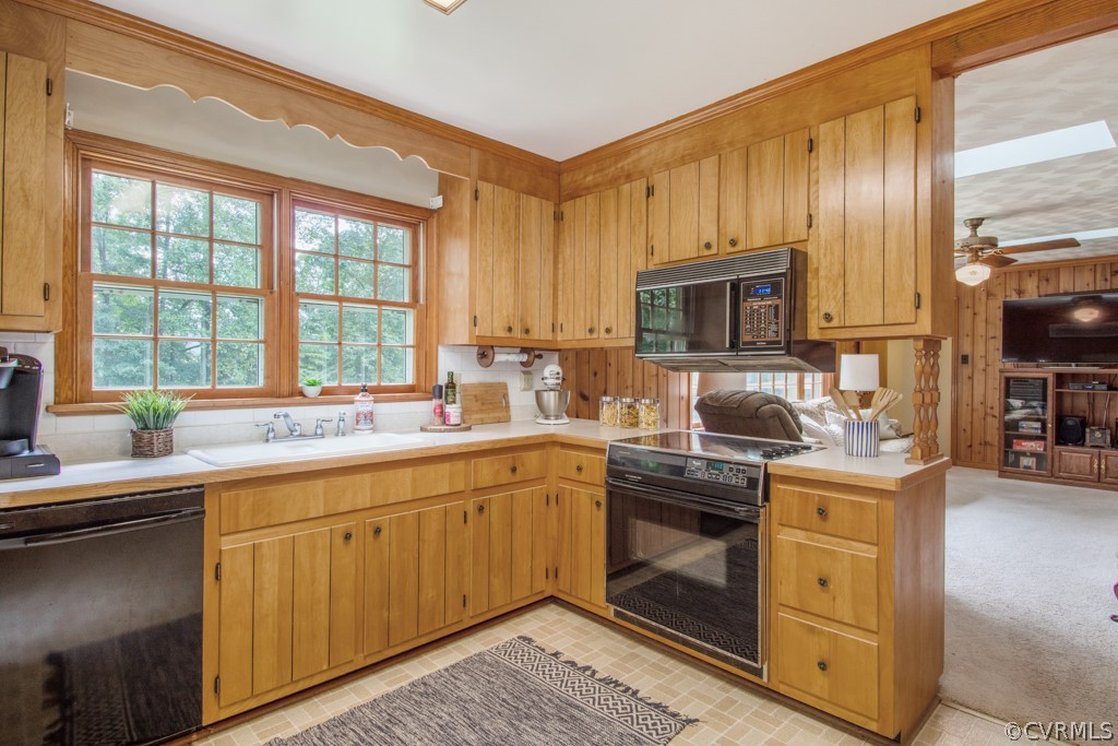 12201 Old Bailey Bridge Road Midlothian, VA 23112 - Photo 10 of 36 a kitchen with a sink stove and cabinets