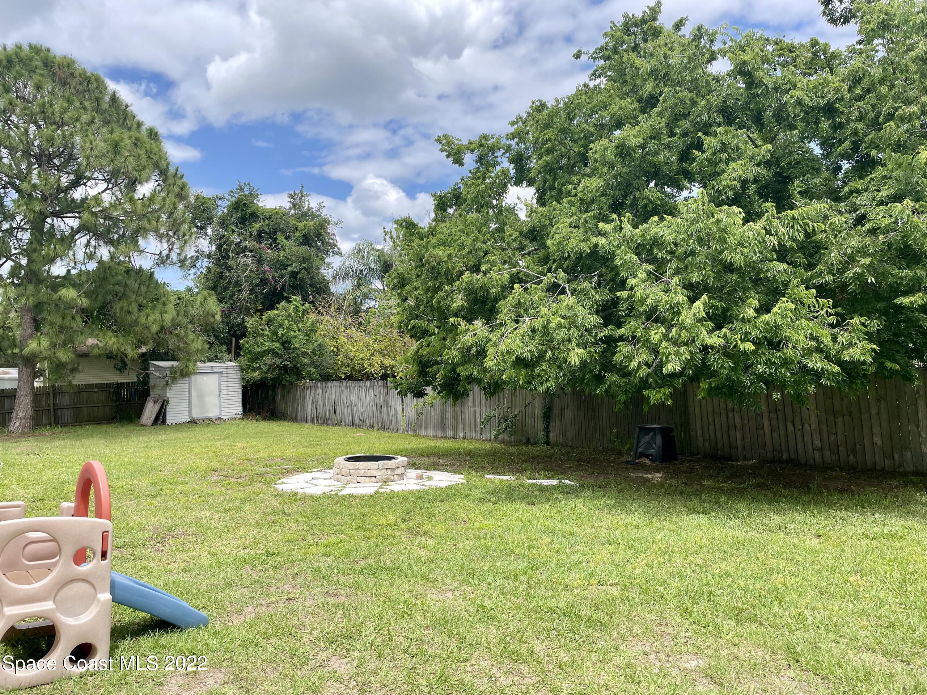 6349 Hunt Road Cocoa, FL 32927 - Photo 28 of 38 Hunt Back Yard Trees