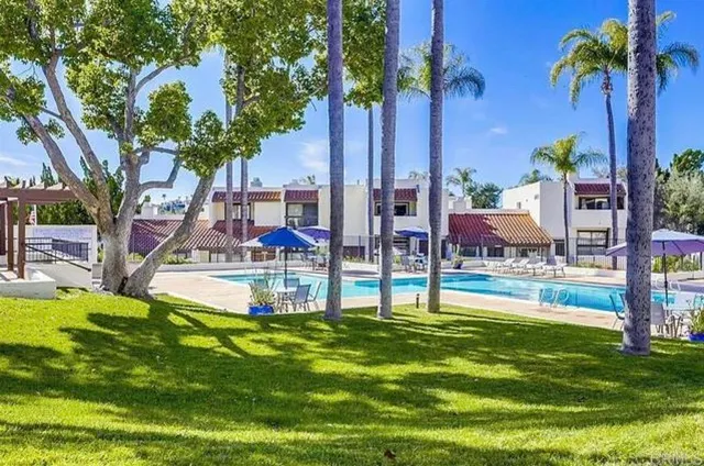 a view of a swimming pool with a garden