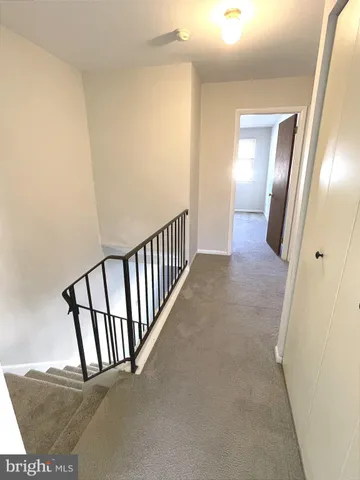 a view of a hallway with entryway