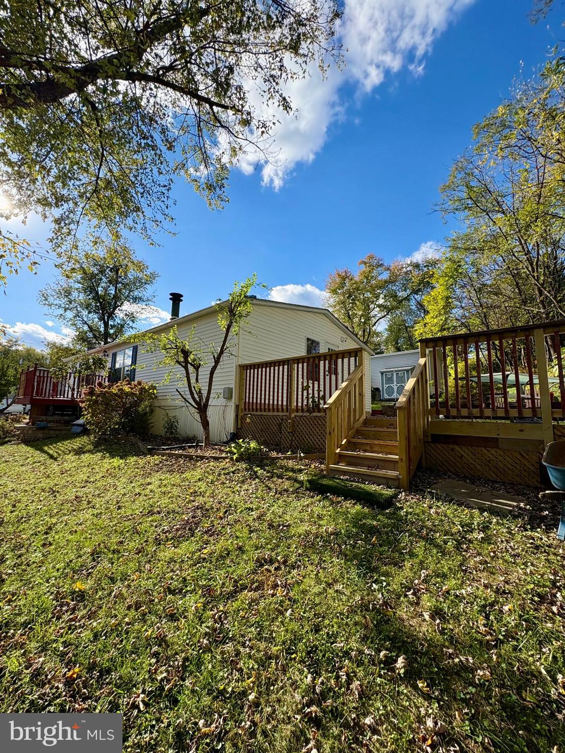 7714 Walnut Lane Mount Airy, MD 21771 - Photo 35 of 42 a view of a house with a yard