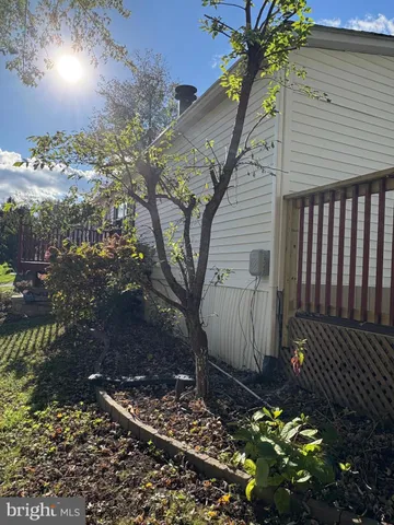 a view of a backyard of the house