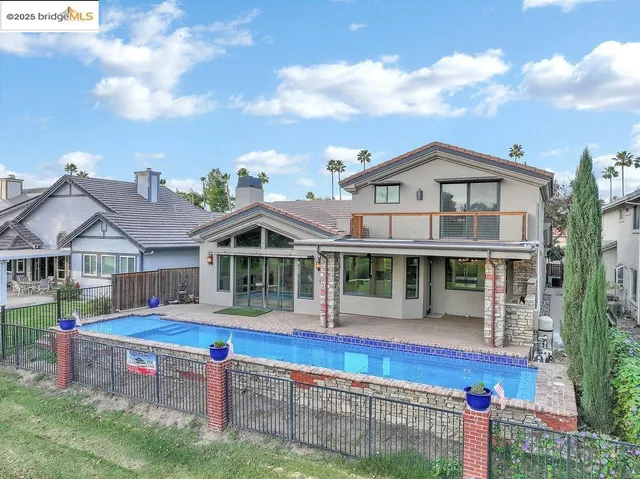 a view of a golf course with a lake view