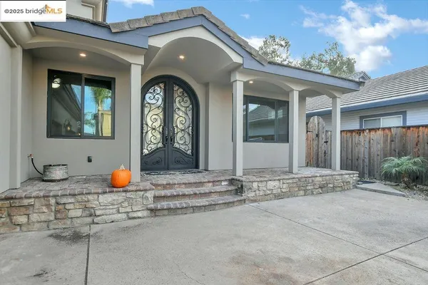 a view of a hallway with washer and dryer