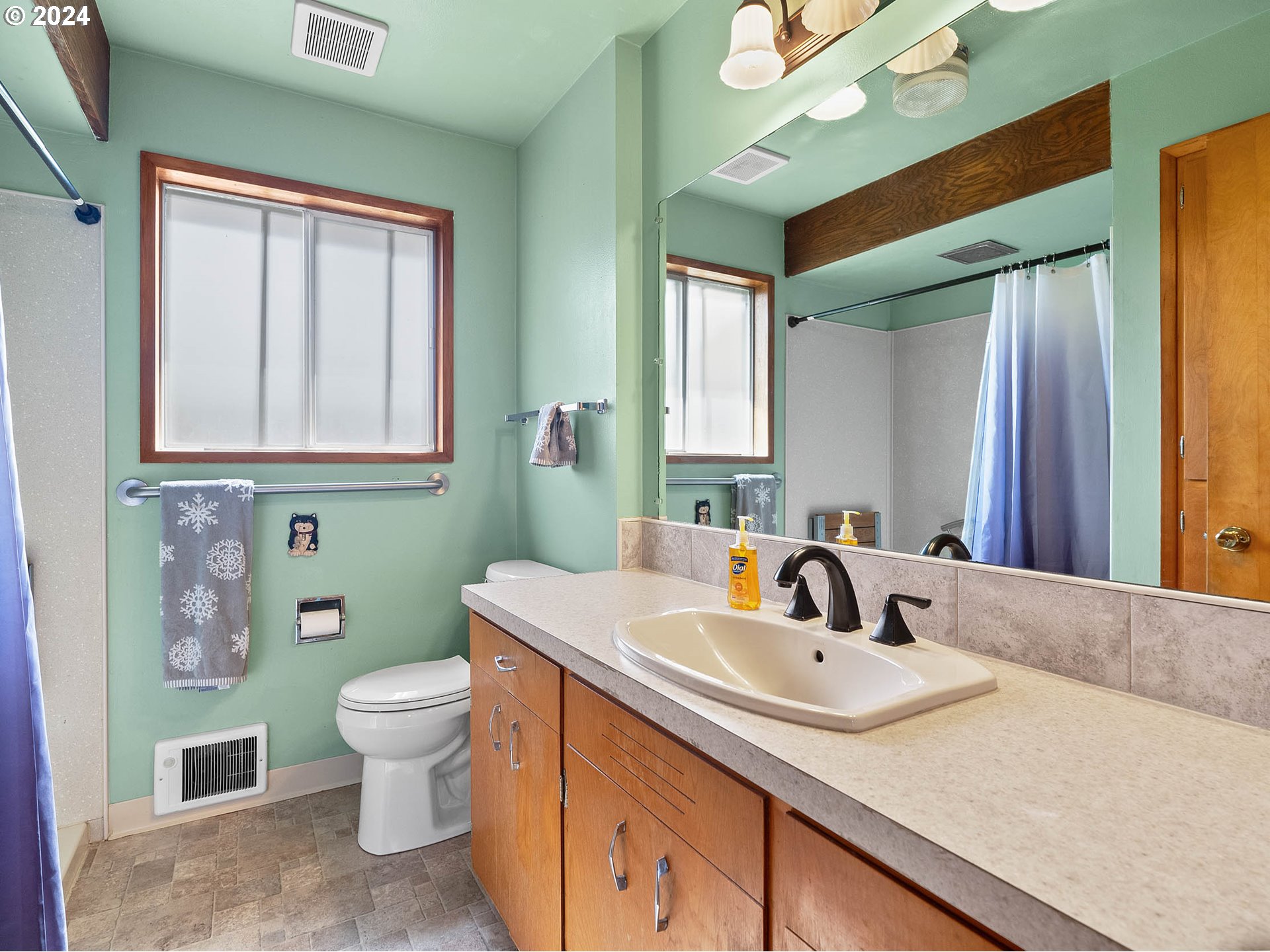 23865 Southwest Tile Flat Road Hillsboro, OR 97123 - Photo 15 of 36 a bathroom with a sink and a toilet