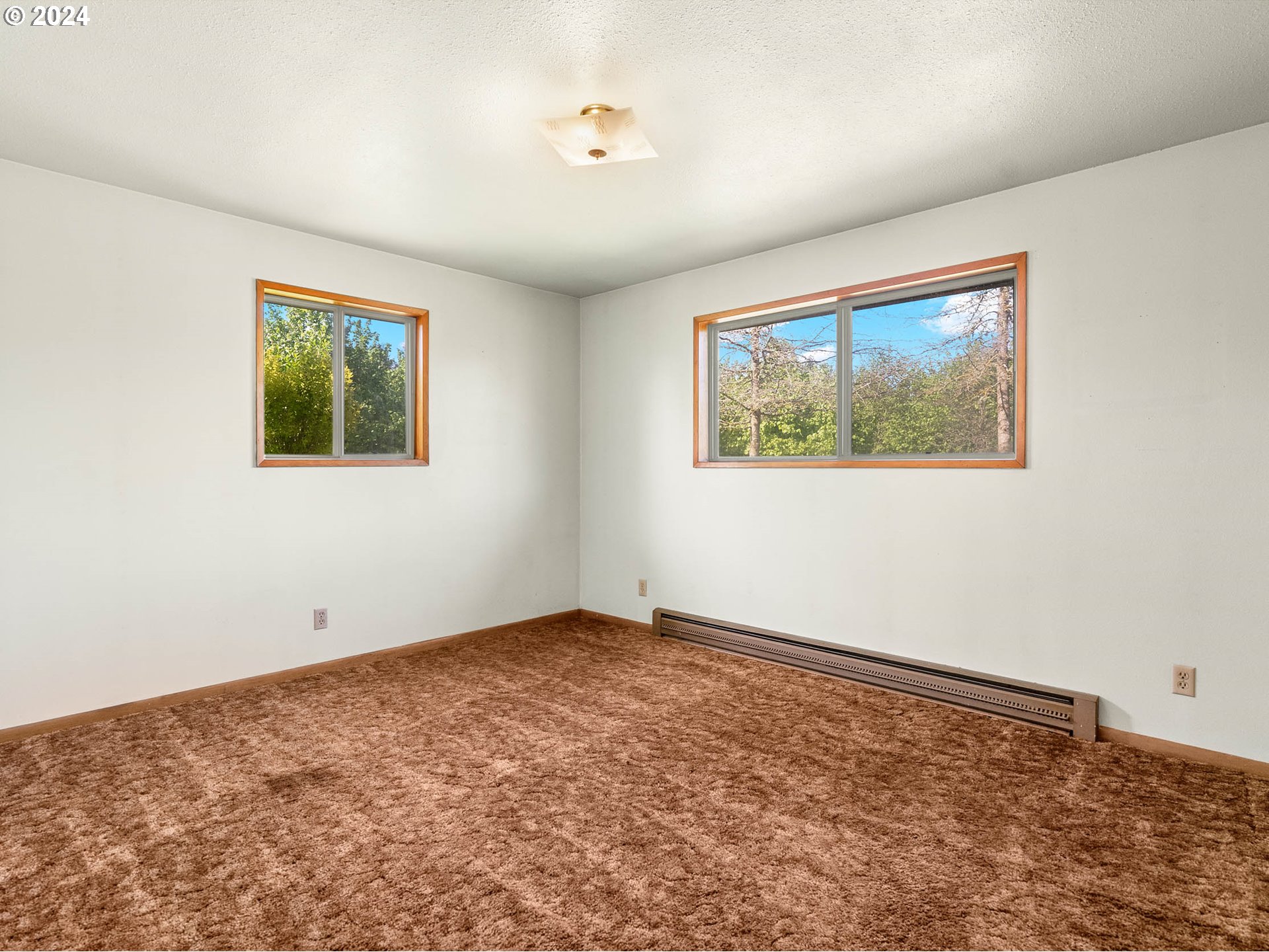23865 Southwest Tile Flat Road Hillsboro, OR 97123 - Photo 16 of 36 a view of an empty room with window