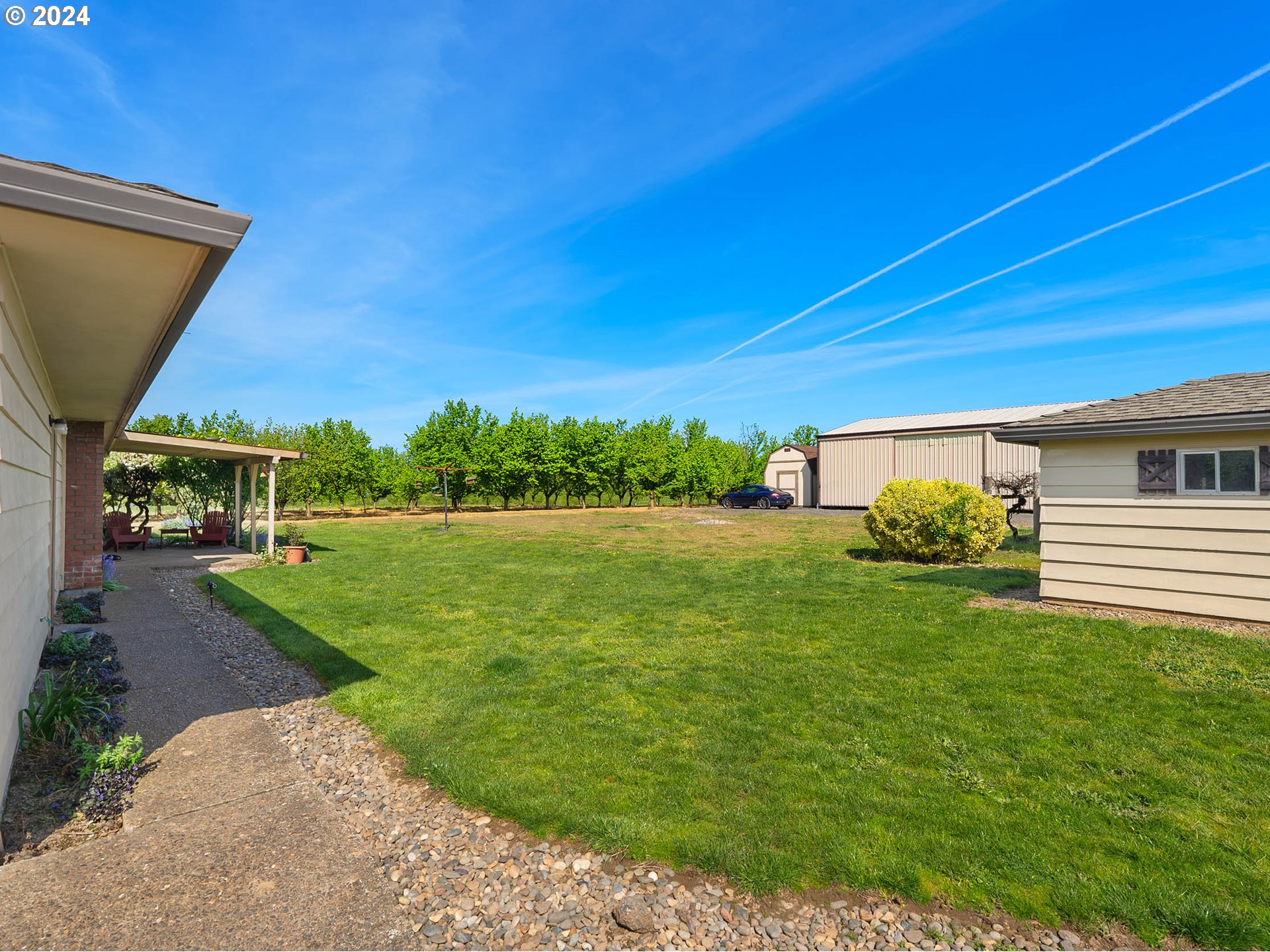23865 Southwest Tile Flat Road Hillsboro, OR 97123 - Photo 26 of 36 a view of a backyard with sitting area