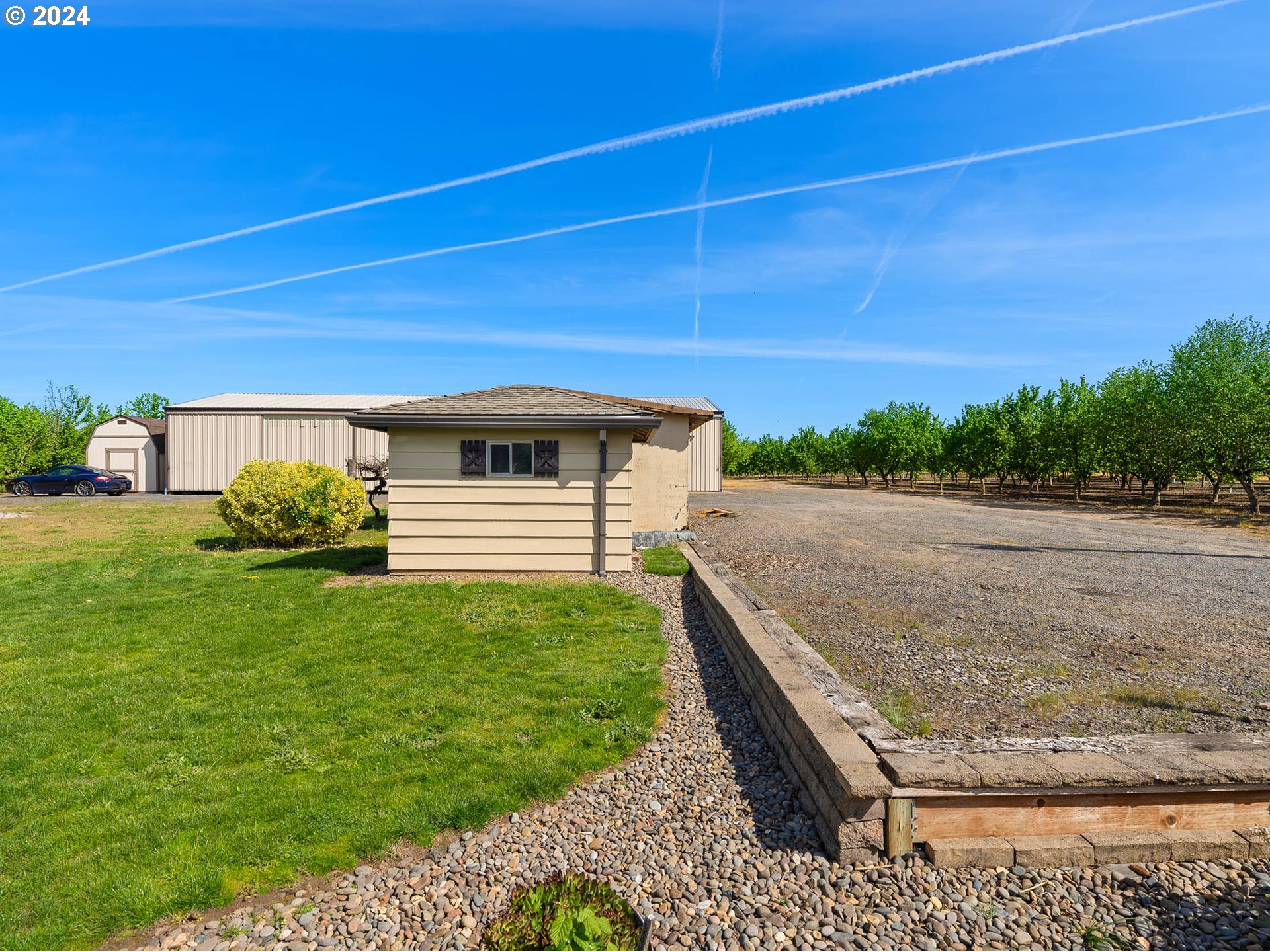 23865 Southwest Tile Flat Road Hillsboro, OR 97123 - Photo 27 of 36 a view of a backyard with side of a house