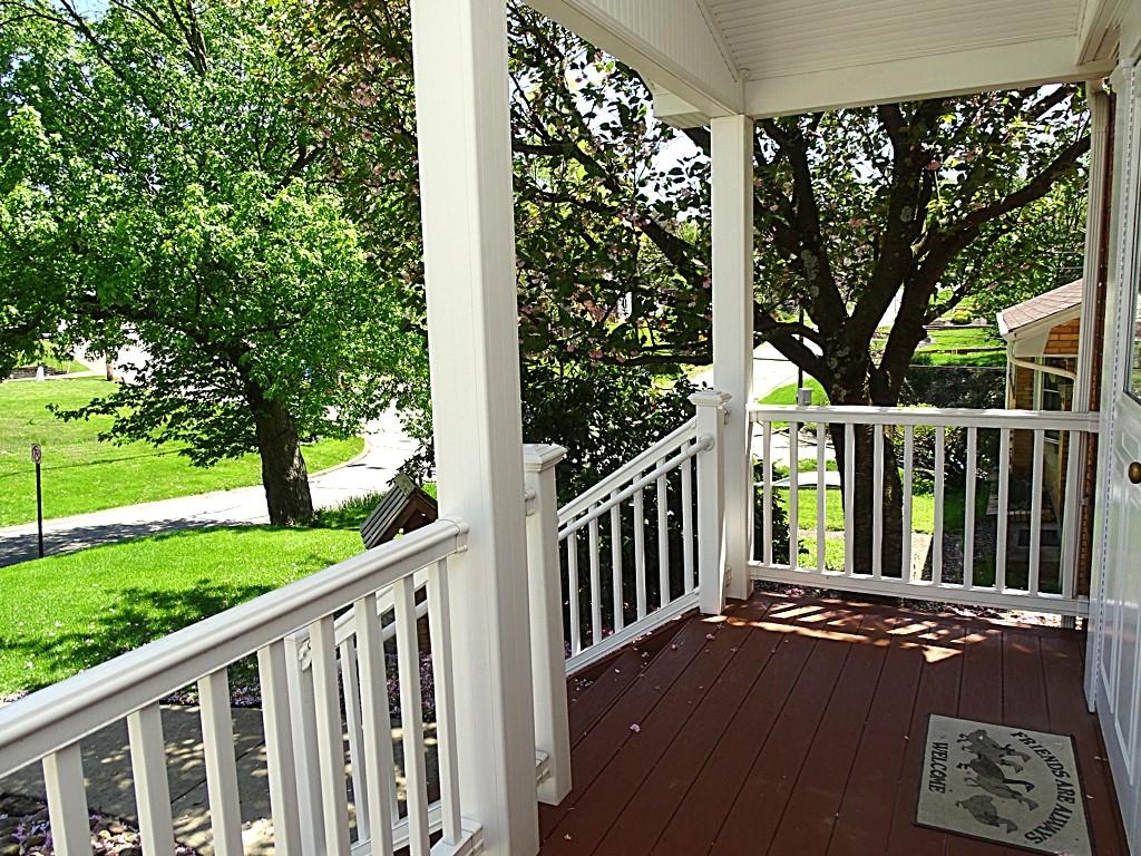 394 Rockhill Road Pittsburgh, PA 15243 - Photo 2 of 25 Darling 2 story brick home in neutral, move-in condition with welcoming, covered front porch!