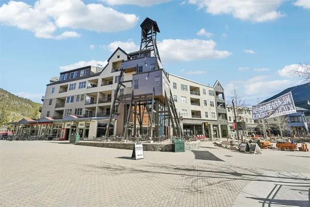 a front view of a building with street view