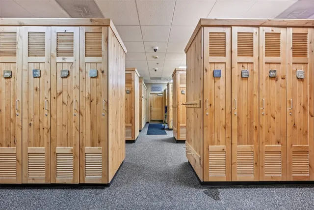 a view of a hallway with entryway door