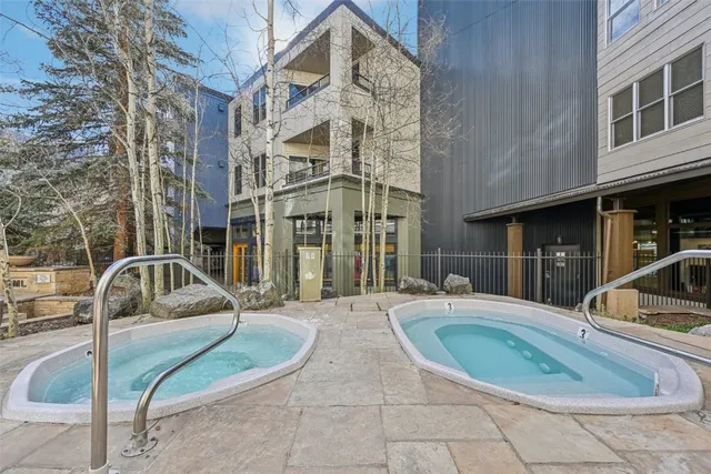 a view of backyard with sitting area