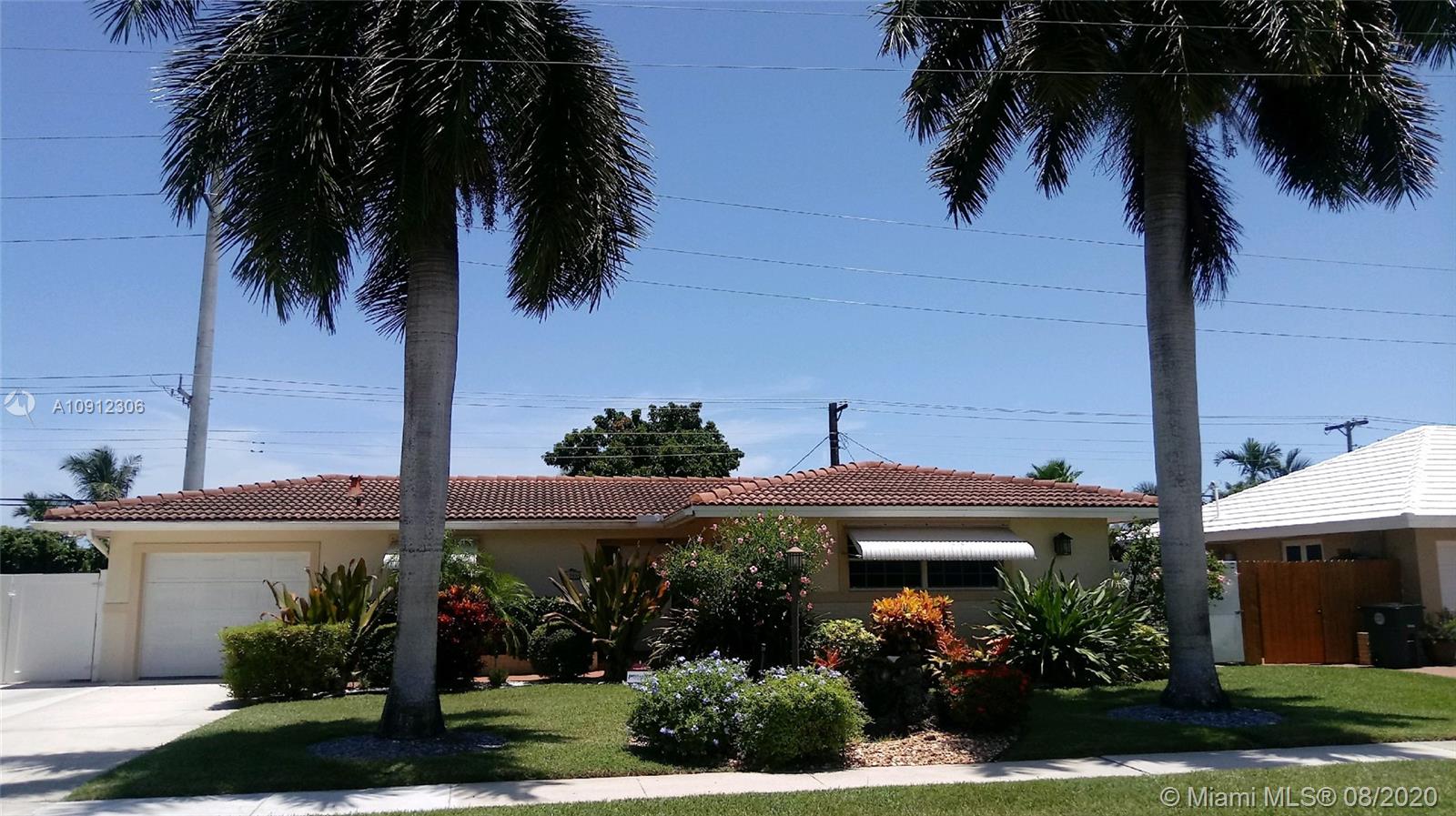 1366 Southwest 9th Avenue Boca Raton, FL 33486 - Photo 1 of 1 a front view of a house with a palm tree
