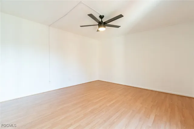 a view of a big room with wooden floor