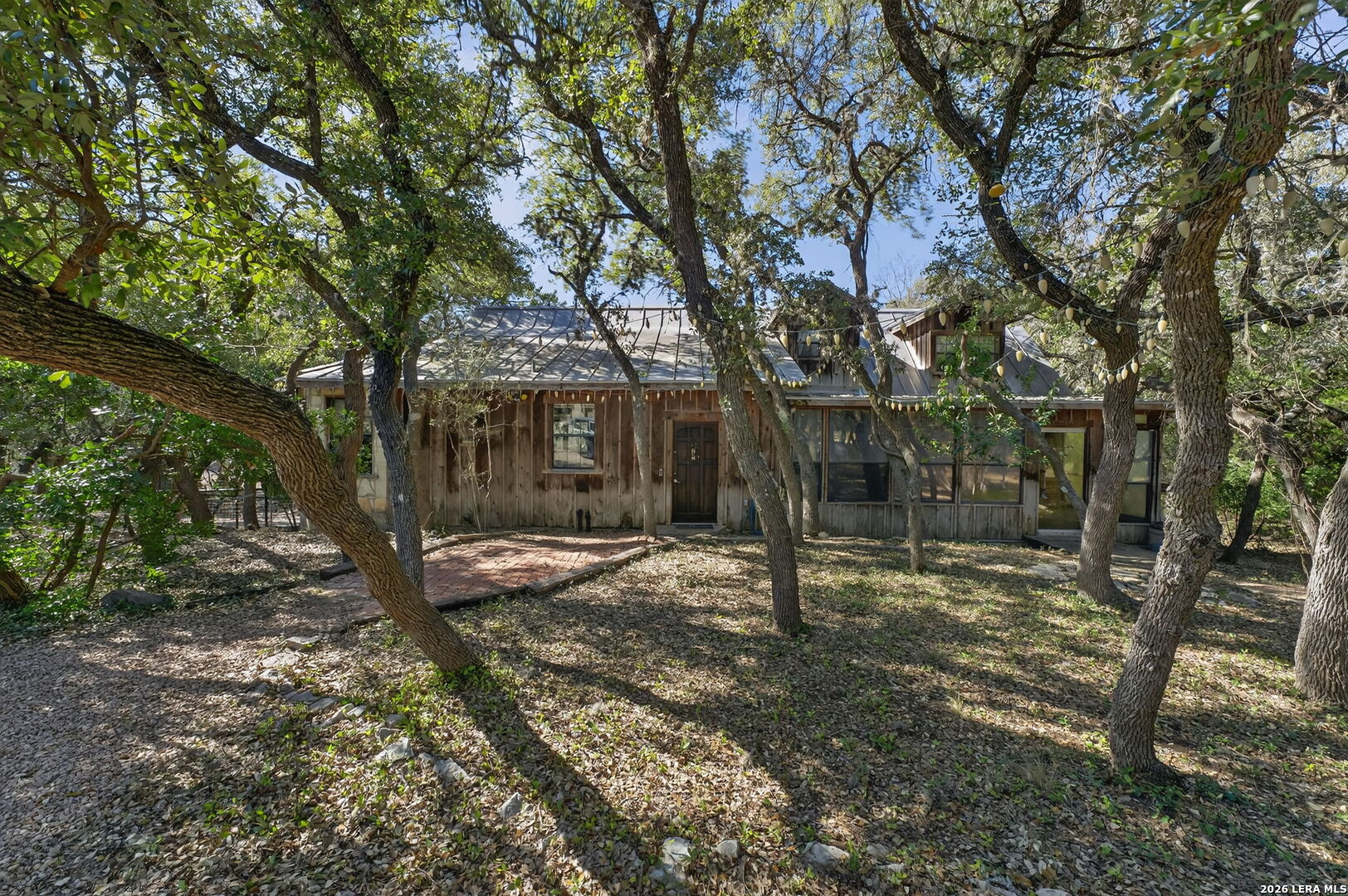 218 Whitworth Road Boerne, TX 78006 - Photo 2 of 26 a tree in the middle of a yard