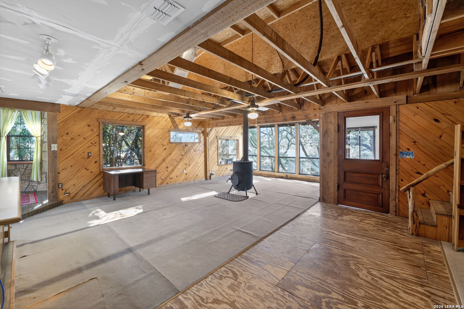 218 Whitworth Road Boerne, TX 78006 - Photo 8 of 26 a view of an empty room with wooden floor