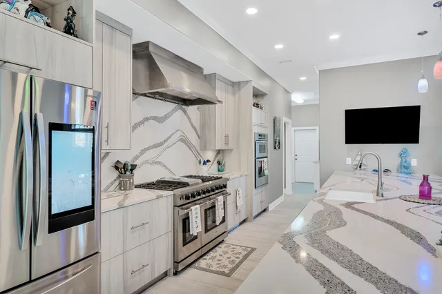 a view of a swimming pool with a lounge chair