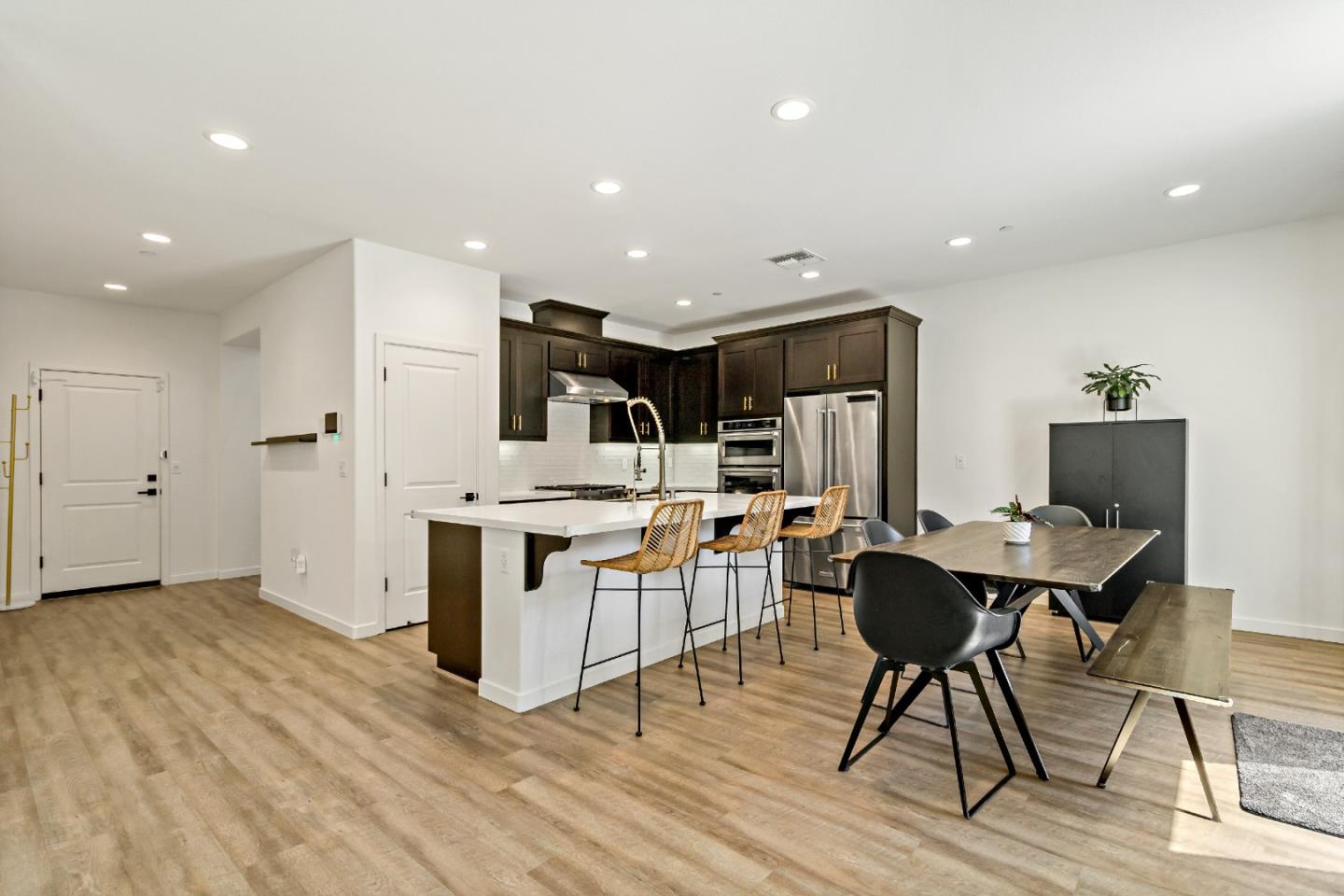 113 Willowrun Way Oakley, CA 94561 - Photo 18 of 63 a living room with stainless steel appliances kitchen island granite countertop furniture and a view of kitchen