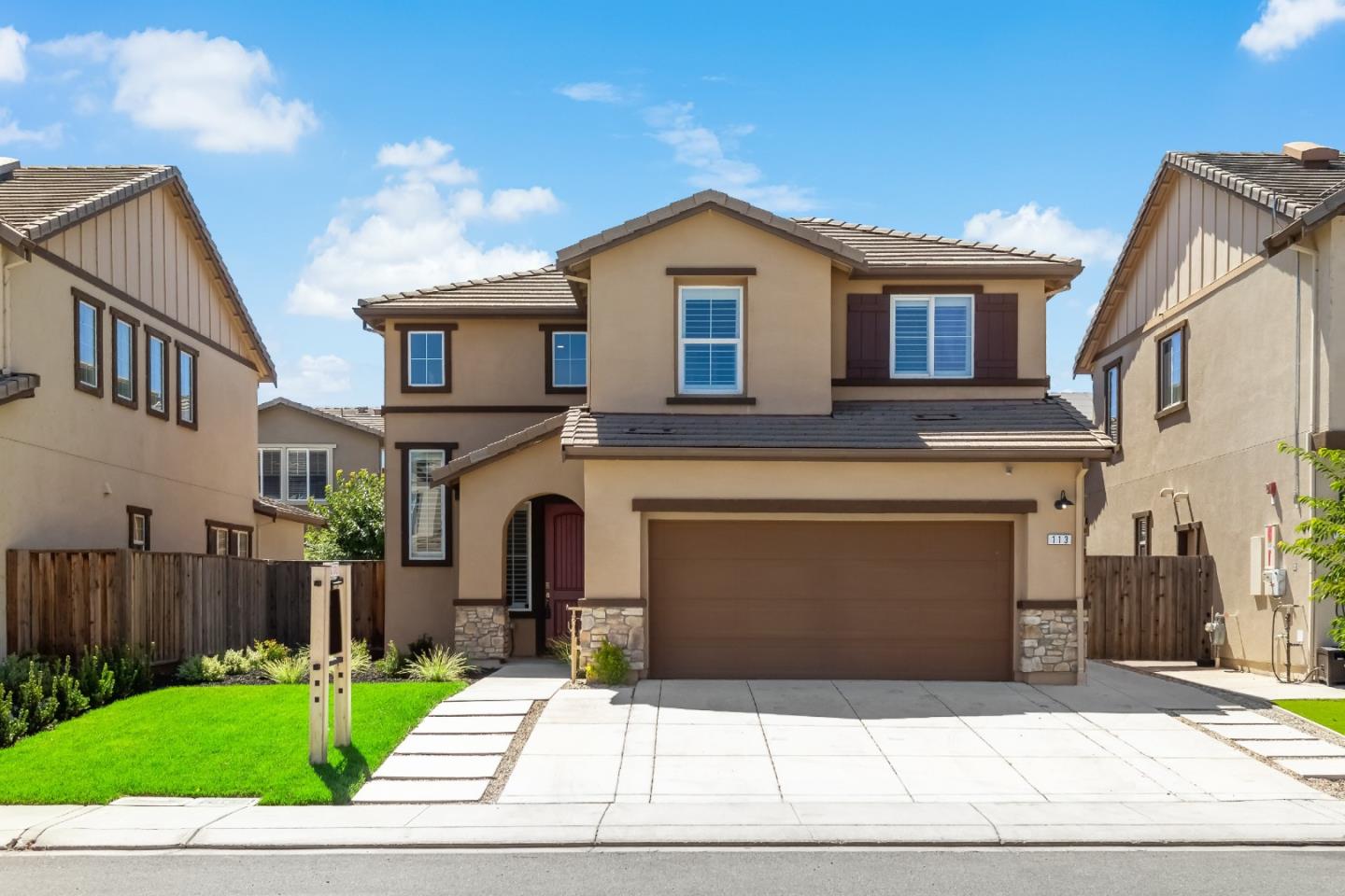 113 Willowrun Way Oakley, CA 94561 - Photo 2 of 63 a front view of a house with a garden
