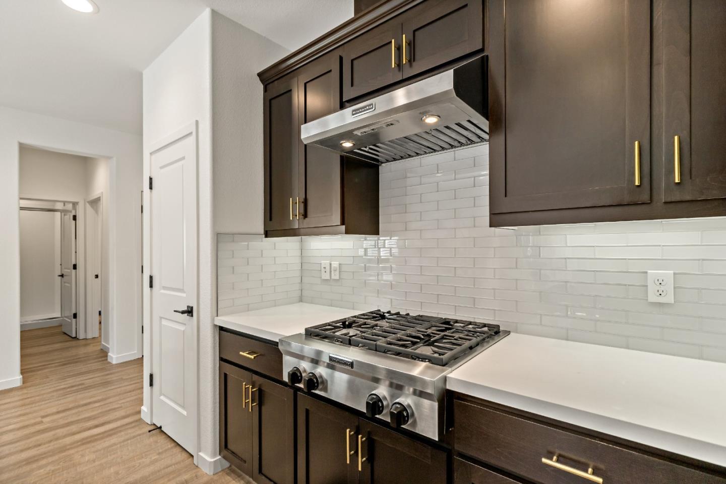 113 Willowrun Way Oakley, CA 94561 - Photo 25 of 63 a kitchen with stainless steel appliances granite countertop a stove and a refrigerator