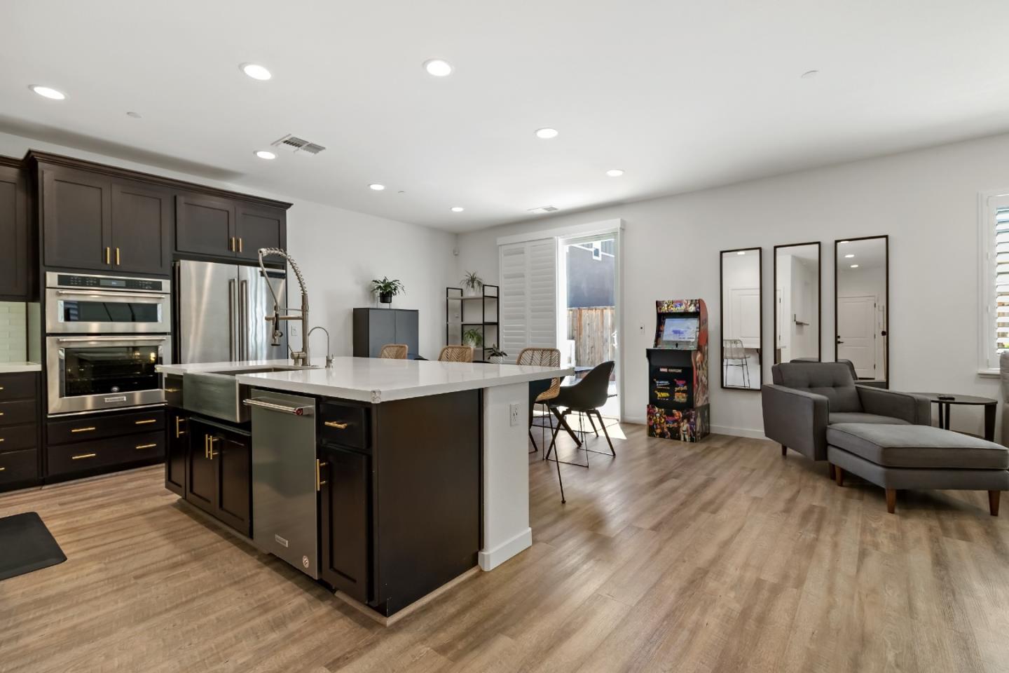 113 Willowrun Way Oakley, CA 94561 - Photo 27 of 63 a kitchen with wooden cabinets and center island