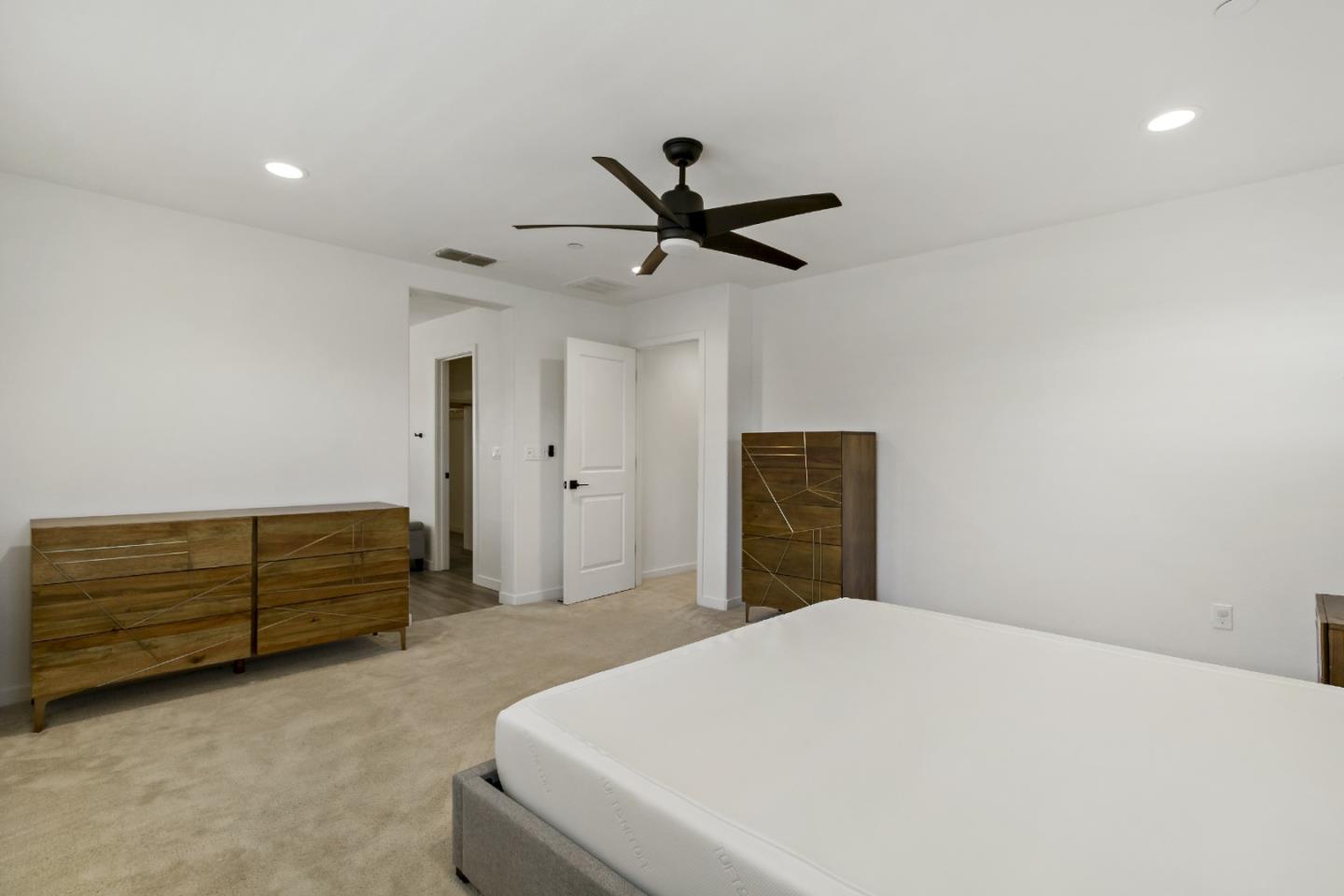 113 Willowrun Way Oakley, CA 94561 - Photo 37 of 63 a bedroom with a bed and a ceiling fan