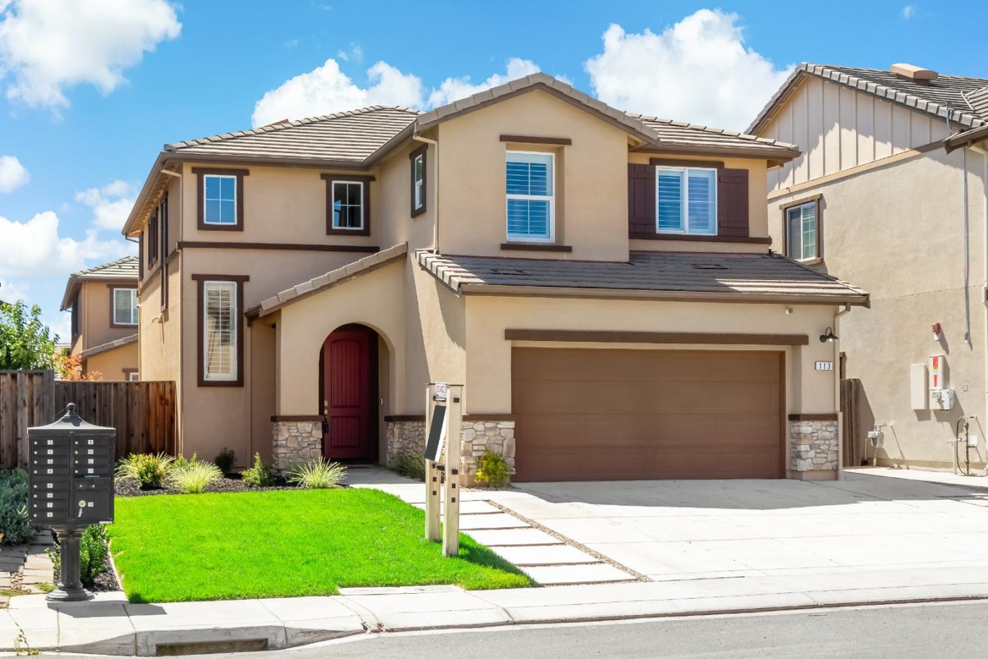 113 Willowrun Way Oakley, CA 94561 - Photo 4 of 63 a front view of a house with a garden and garage