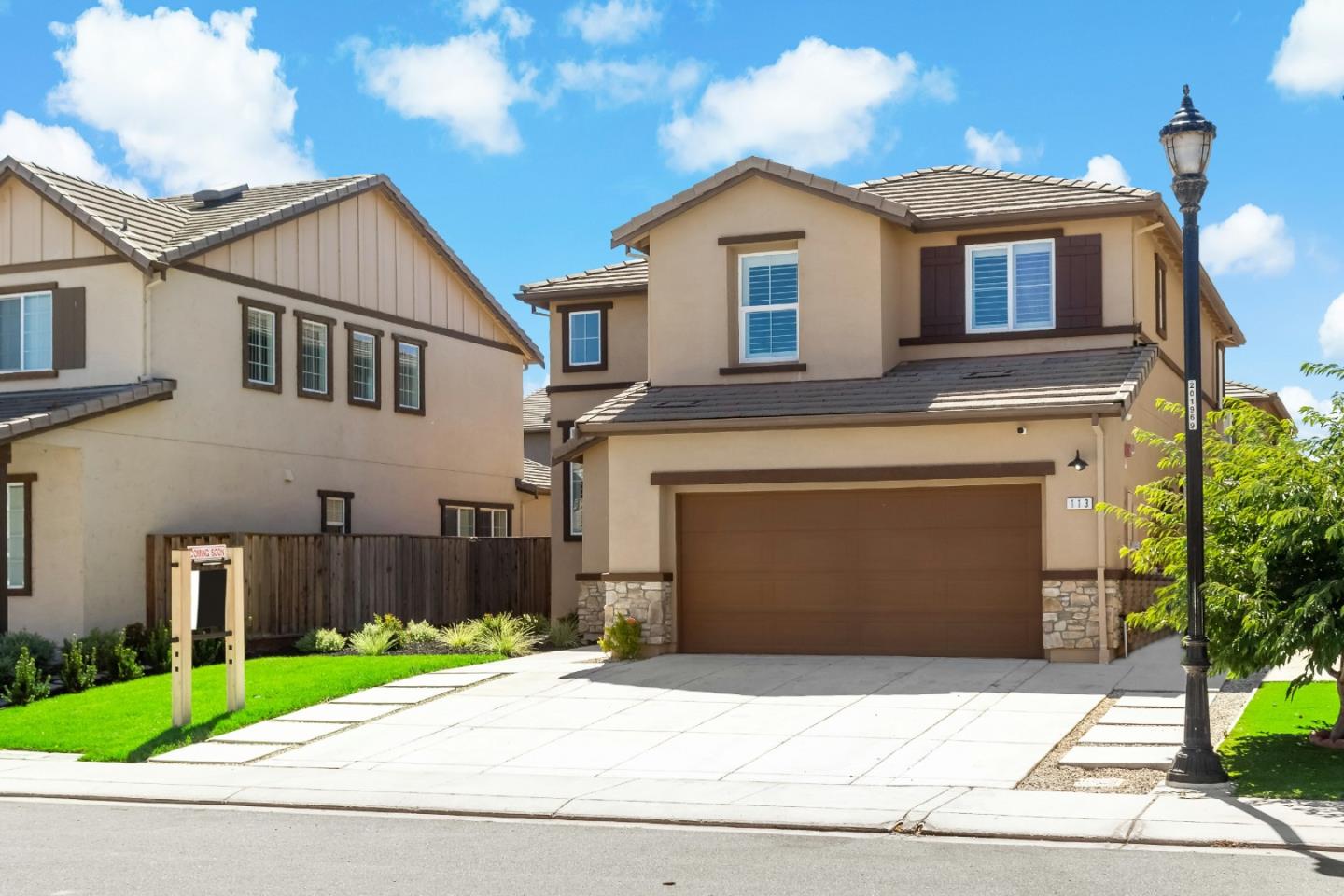 113 Willowrun Way Oakley, CA 94561 - Photo 5 of 63 a front view of a house with a yard and garage