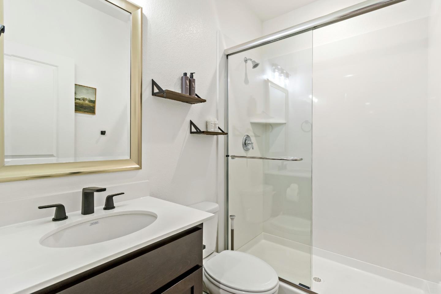 113 Willowrun Way Oakley, CA 94561 - Photo 51 of 63 a bathroom with a sink toilet and shower