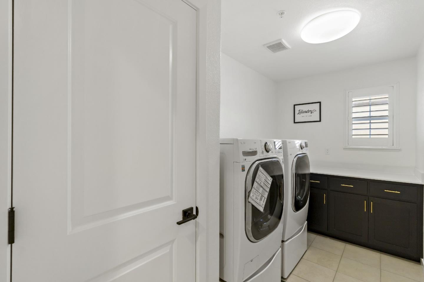113 Willowrun Way Oakley, CA 94561 - Photo 52 of 63 a utility room with dryer and washer